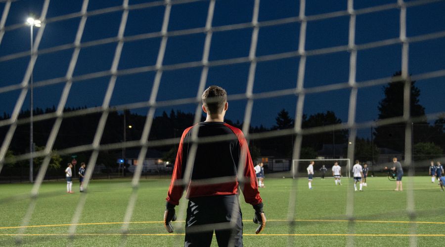 soccer field under LED stadium lighting showing improved visibility